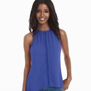 Ladder-trim high low shell top